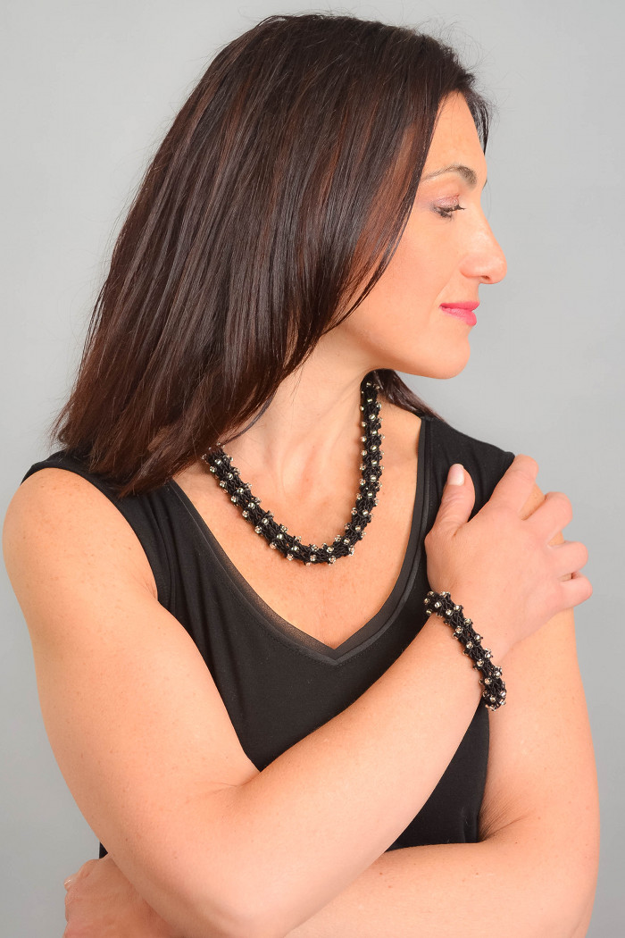 ebony neckl and brac side view website